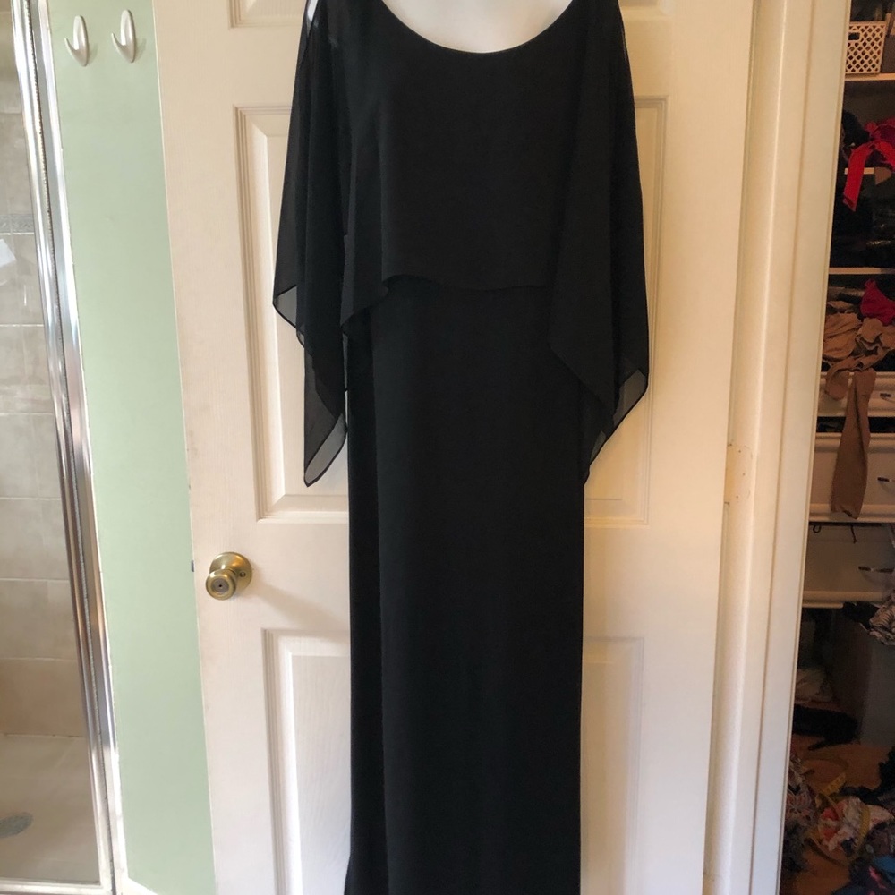 Elegant black dress with sheer overlay
